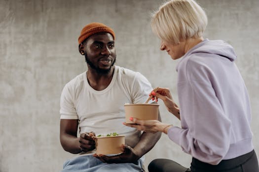 Man enjoying a balanced meal with friends