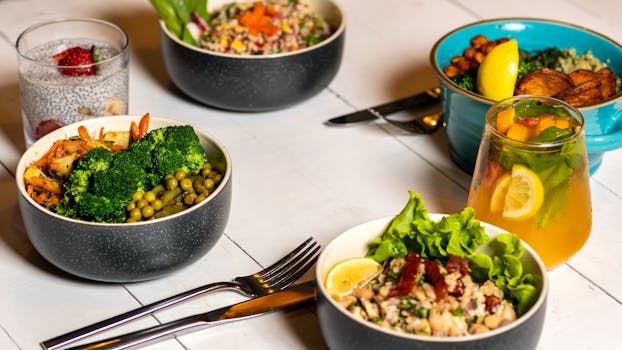 bowl of mixed greens with vinaigrette