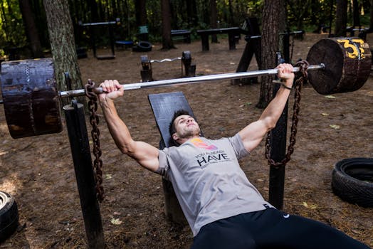 man lifting weights