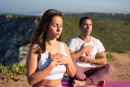 man practicing yoga in nature